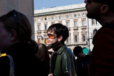 Portrait of couple standing in city