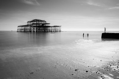 Pier on sea against sky