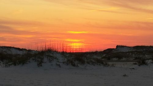 Scenic view of dramatic sky during sunset