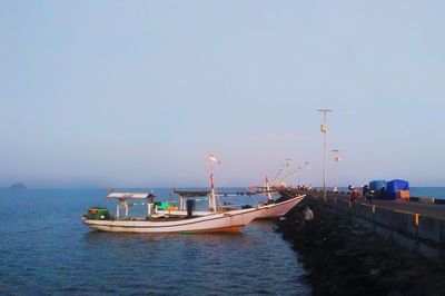 Nautical vessel on sea against clear sky