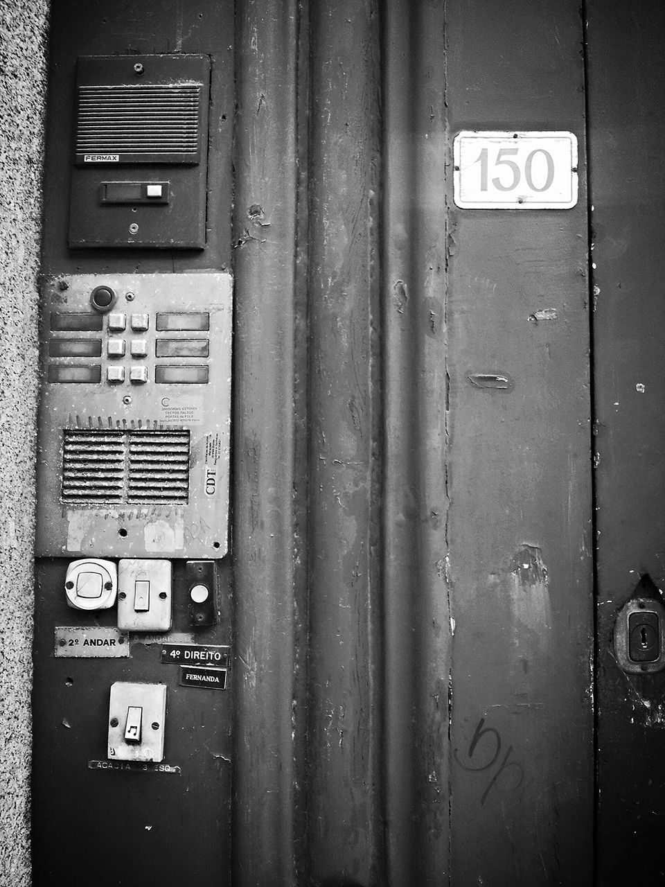 door, communication, closed, safety, full frame, security, text, built structure, number, metal, close-up, protection, architecture, old, western script, backgrounds, wall - building feature, no people, building exterior, wood - material