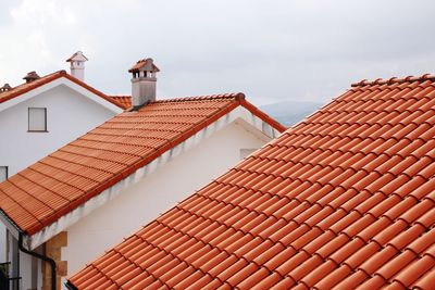 Low angle view of houses against sky