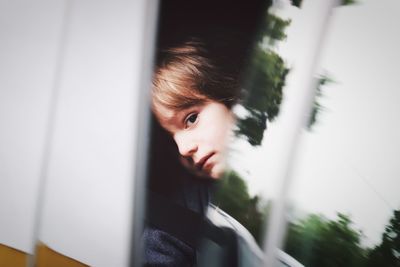 Portrait of young woman looking away
