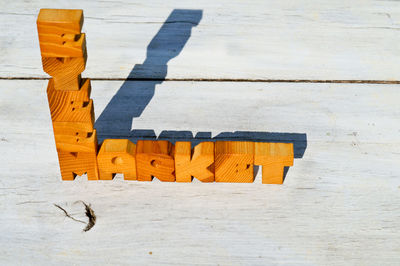 High angle view of text made with toy blocks on table