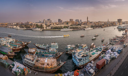 Fish-eye of dubai creek against sky