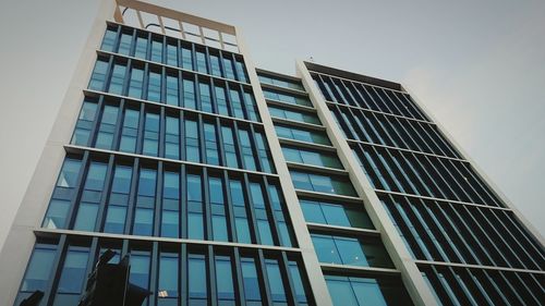 Low angle view of modern building against sky