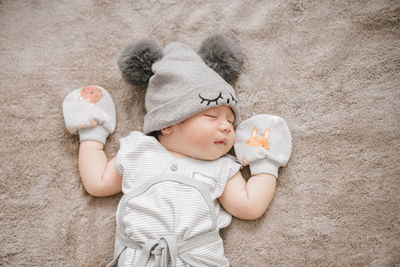 High angle view of baby sleeping 