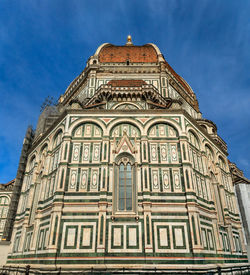 Low angle view of historic building against sky