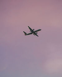Low angle view of airplane against clear sky