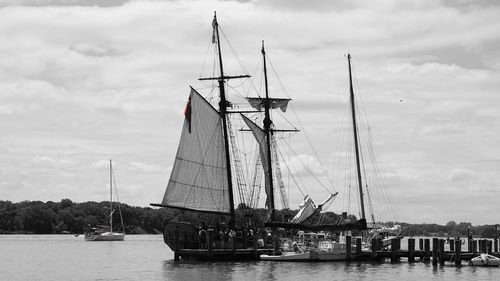 Boats sailing in harbor