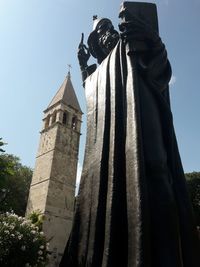 Low angle view of statue against clear sky