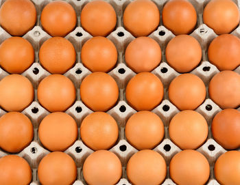 Full frame shot of eggs in crate