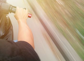 Close-up of woman riding motorcycle