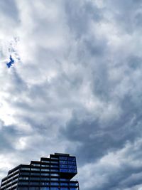 Low angle view of modern building against sky