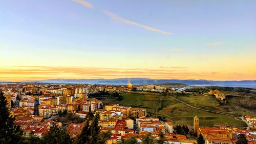 High angle view of townscape against sky at sunset