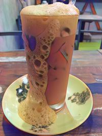 Close-up of drink served on table