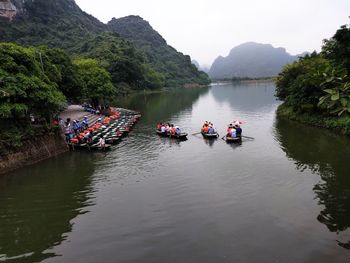 Scenic view of boats in river