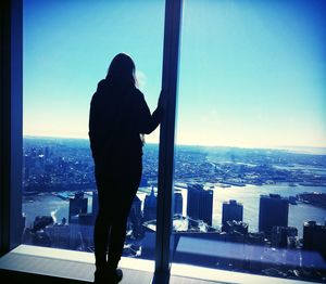 Woman looking at cityscape