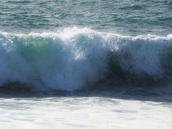 Waves splashing on rocks