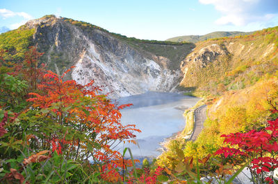 Scenic view of lake against sky during autumn