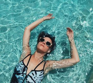 Young woman in swimming pool