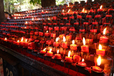 Illuminated candles at church