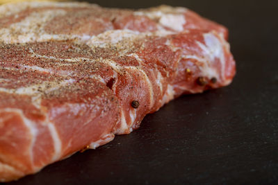 High angle view of beef on slate