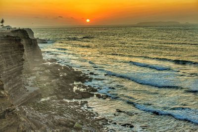 Scenic view of sea against sky during sunset