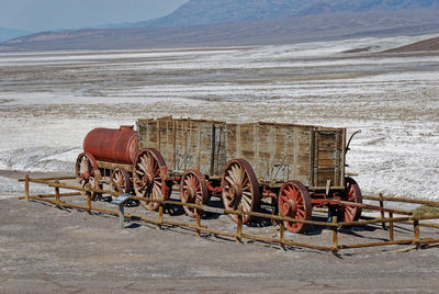 Old rusty train close to a salt lake