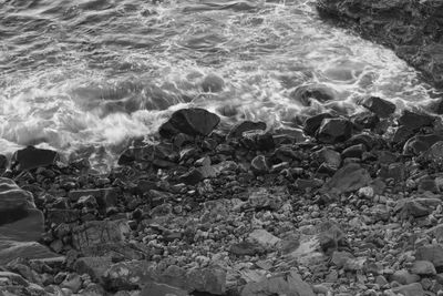 High angle view of rocks on beach