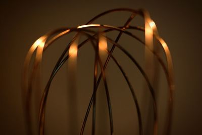 Close-up of illuminated lighting equipment