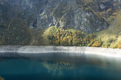 Scenic view of lac d oo against mountain