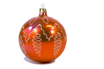 Close-up of christmas decoration against white background