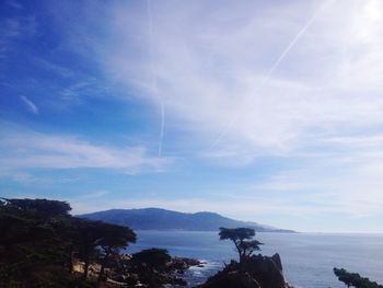 Scenic view of vapor trails in sky