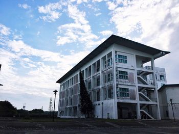 View of building against cloudy sky