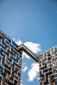 Low angle view of building against clear blue sky