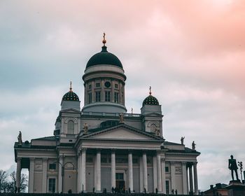 Low angle view of tuomiokirkko  against sky