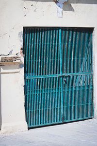 Closed blue door of building