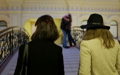 Rear view of woman standing in park