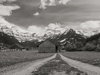 House on field against sky