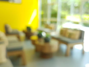 Close-up of chairs on table in restaurant