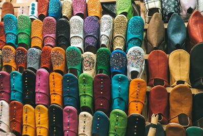 Full frame shot of multi colored shoes for sale in market