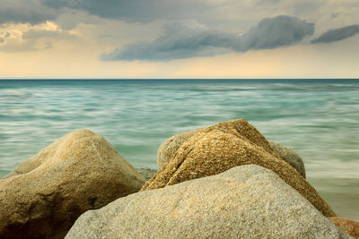 Scenic view of sea against sky during sunset