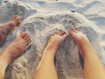 Low section of people on beach