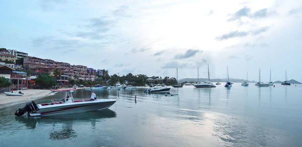 Boats moored in harbor