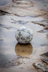 High angle view of soccer ball on beach