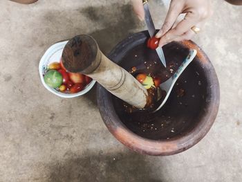 High angle view of person preparing food in bowl