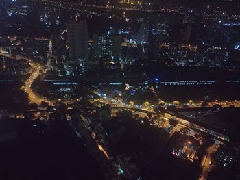 Aerial view of illuminated cityscape at night