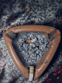 High angle view of heart shape on rusty metal