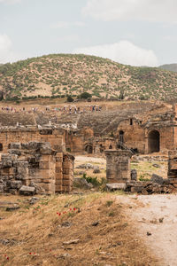 Old ruin building against cloudy sky